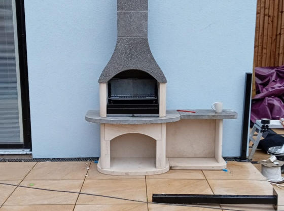 Stone patio and outdoor barbecue area